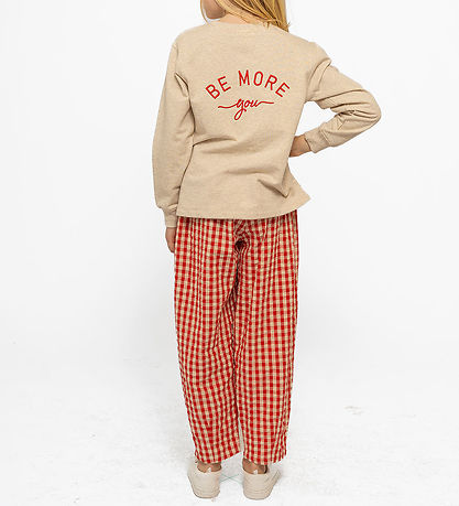 The New Broek en Scrunchie - TnNally - Poppy Rode Controle The New Broek en Scrunchie - TnNally - Poppy Rode Controle