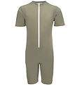 Petit Crabe Coverall Swimsuit - Noe - UV50+ - Olive w. Cherries Petit Crabe Coverall Swimsuit - Noe - UV50+ - Olive w. Cherries