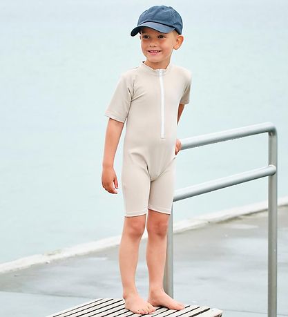 Petit Crabe Coverall Swimsuit - Noe - UV50+ - Latte Petit Crabe Coverall Swimsuit - Noe - UV50+ - Latte