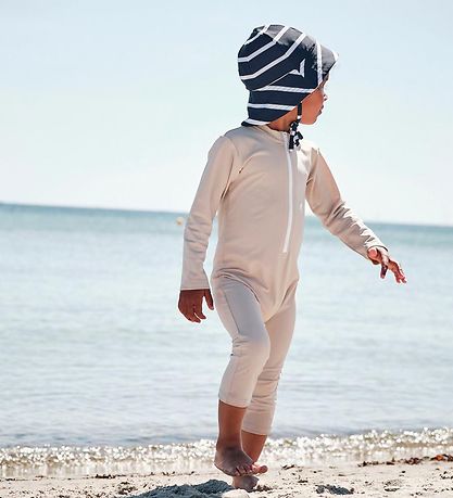 Petit Crabe Badoverall - Lou - UV50+ - Latte