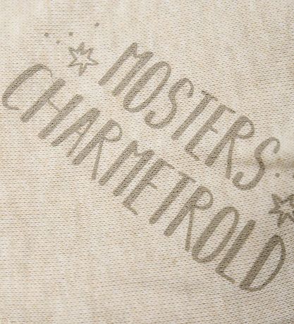 Bavoir Bandana Pippi - Pointu - Sandshall av. Le charmeur de tan Bavoir Bandana Pippi - Pointu - Sandshall av. Le charmeur de tan