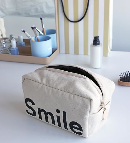 Design Letters Toiletry Bag - Smile - Natural/Black