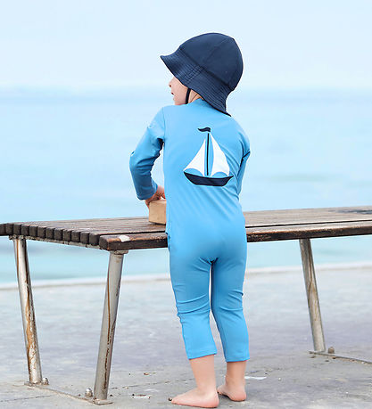 Petit Crabe Coverall Swimsuit - Lou - UV50+ - Cornflower w. Sail Petit Crabe Coverall Swimsuit - Lou - UV50+ - Cornflower w. Sail