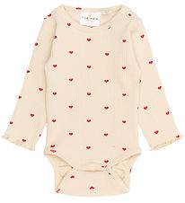 The New Siblings Romper l/s - TnsbRhea - Rib - Gardenia AOP The New Siblings Romper l/s - TnsbRhea - Rib - Gardenia AOP