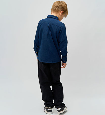 The New Jeans - Loos Fit - TnReturn - Black Denim The New Jeans - Loos Fit - TnReturn - Black Denim