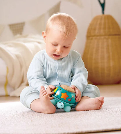 Hape Activity Toy - Twist & Tune Musical Turtle